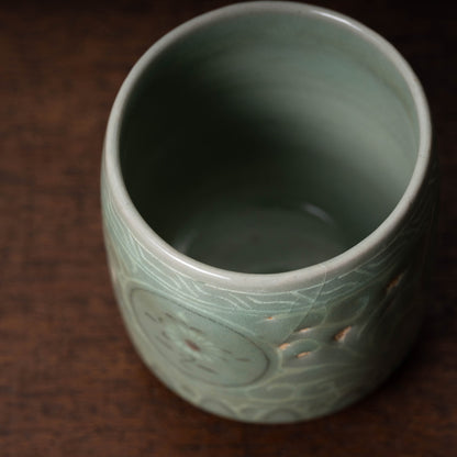 Goryeo Celadon Cylindrical Tea Bowl with Inlaid Chrysanthemum Design