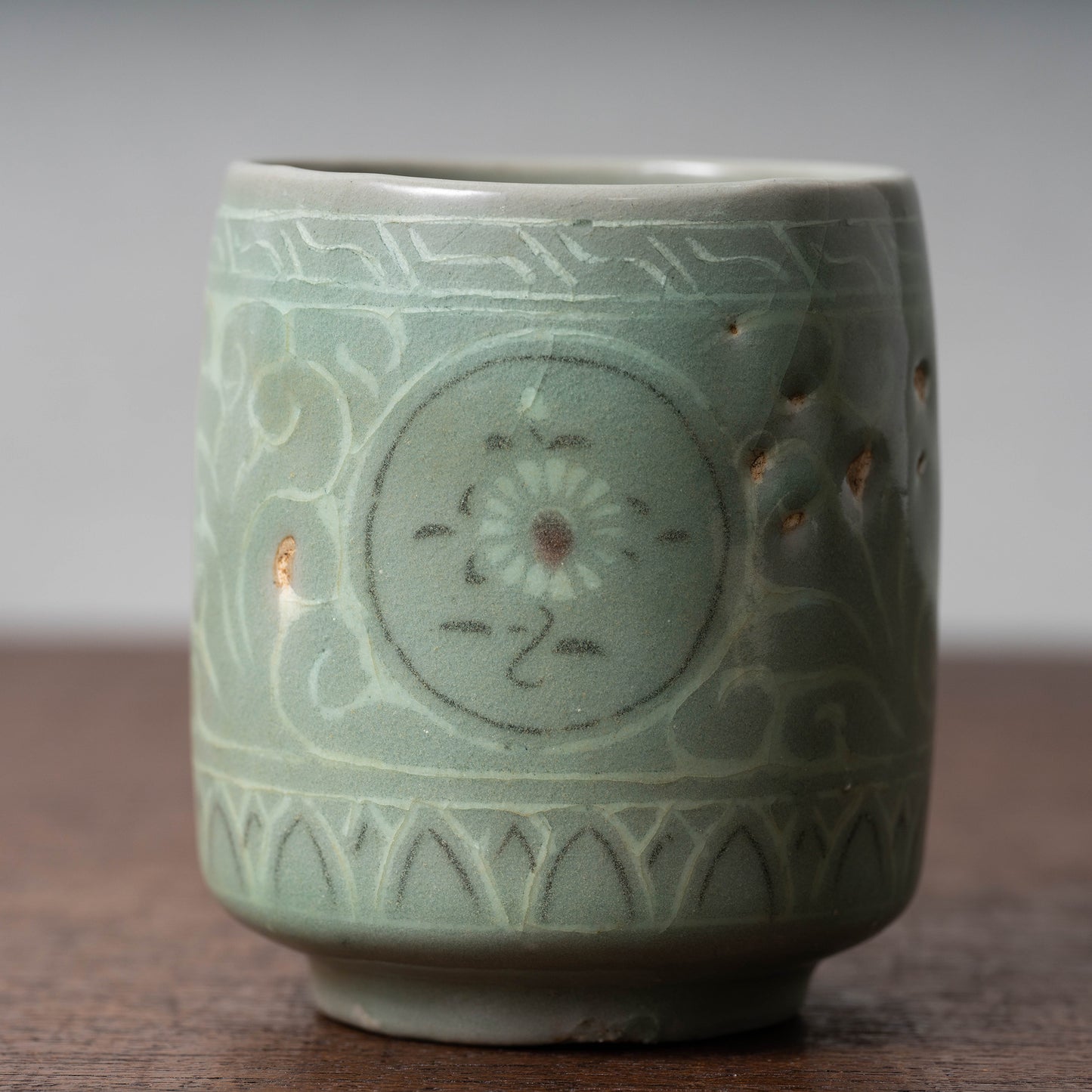 Goryeo Celadon Cylindrical Tea Bowl with Inlaid Chrysanthemum Design