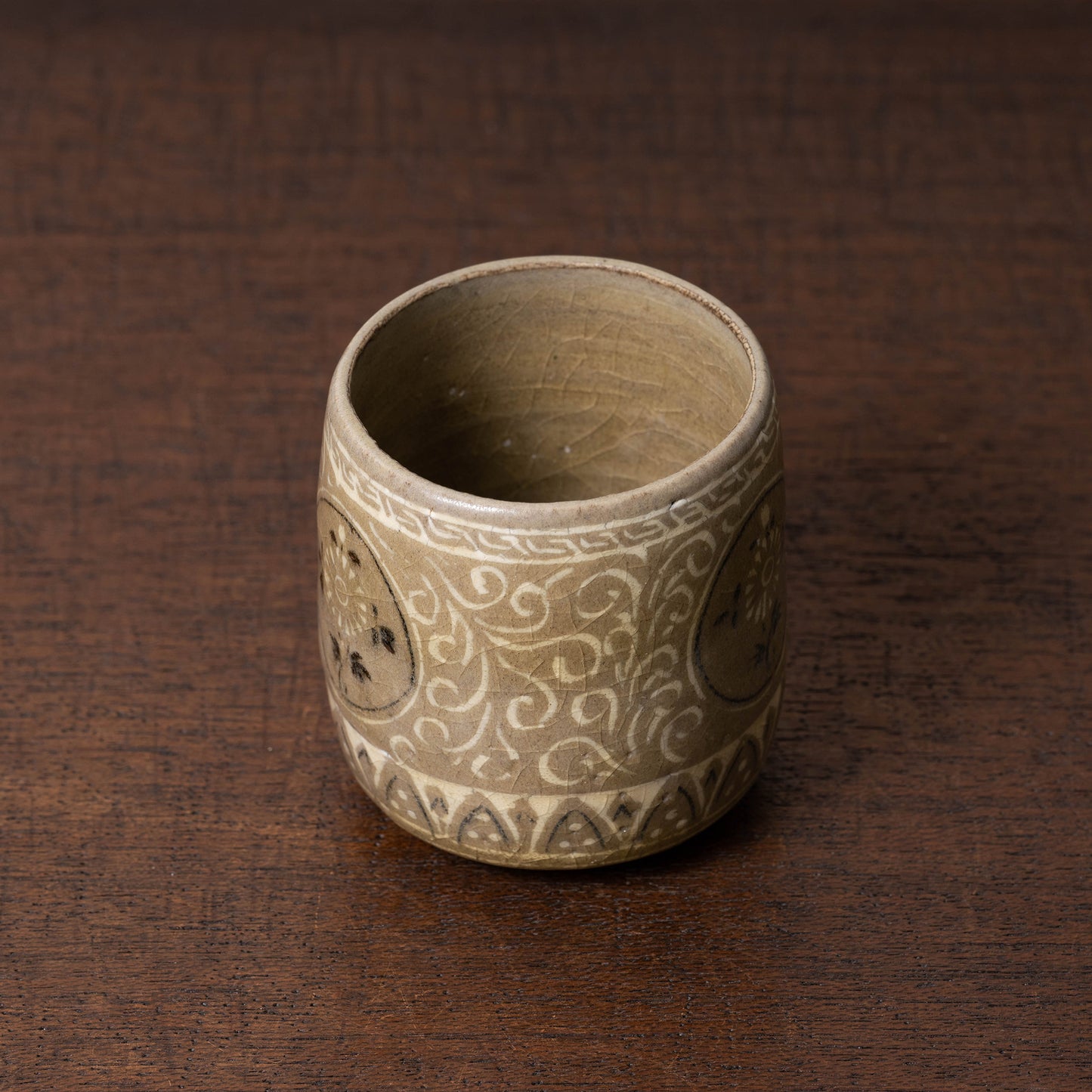 Goryeo Rice-colored Celadon Cylindrical Tea Bowl with Inlaid Chrysanthemum Design