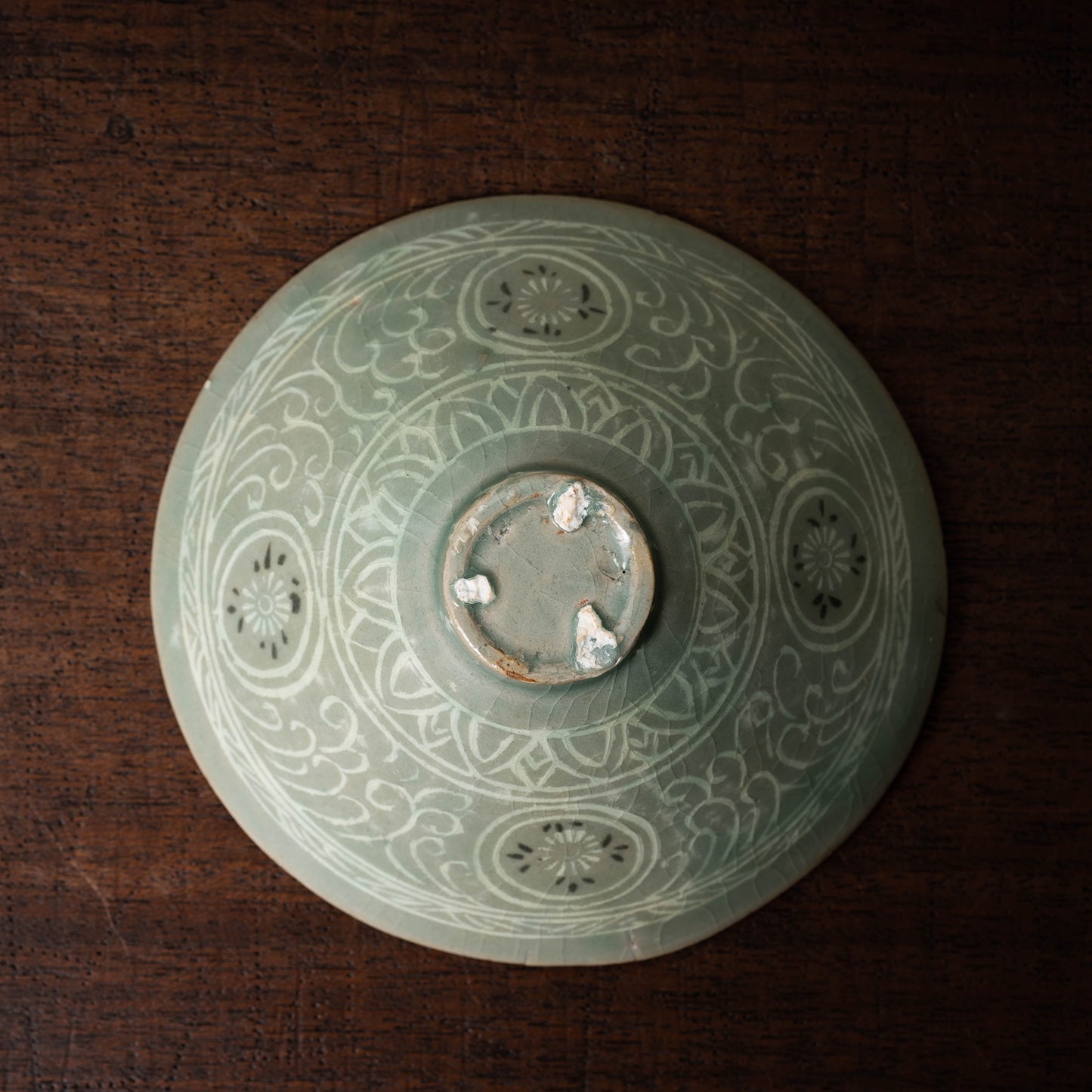 Goryeo Dynasty Celadon Tea Bowl with Inlaid Cloud and Dragon Design