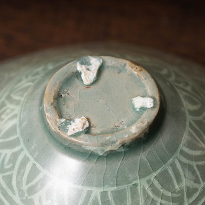 Goryeo Dynasty Celadon Tea Bowl with Inlaid Cloud and Dragon Design