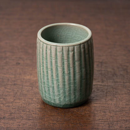 Goryeo Celadon Cylindrical Tea Bowl with Bamboo Chrysanthemum Design