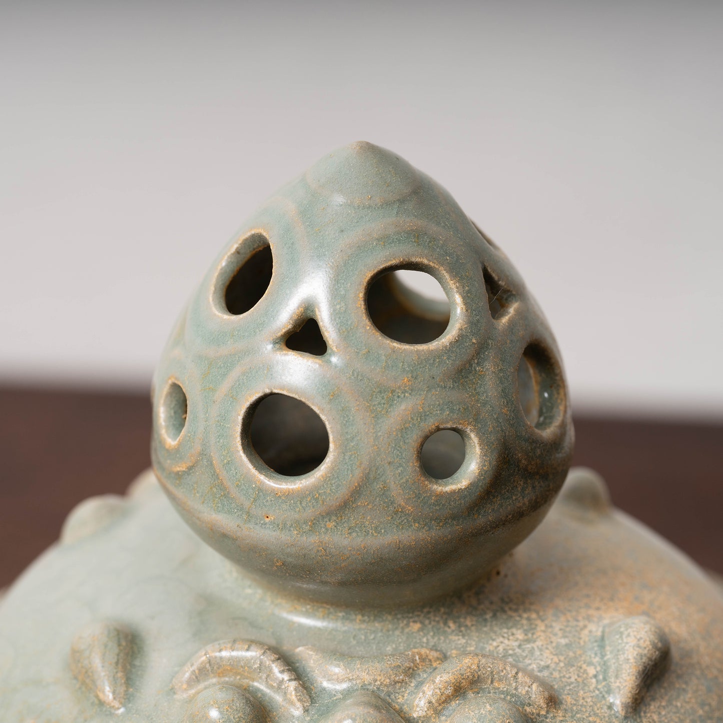 Goryeo Celadon Censer with Animal Face Lid and Openworked Dragon Design