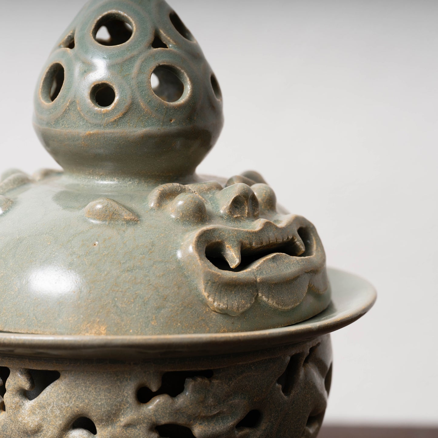 Goryeo Celadon Censer with Animal Face Lid and Openworked Dragon Design