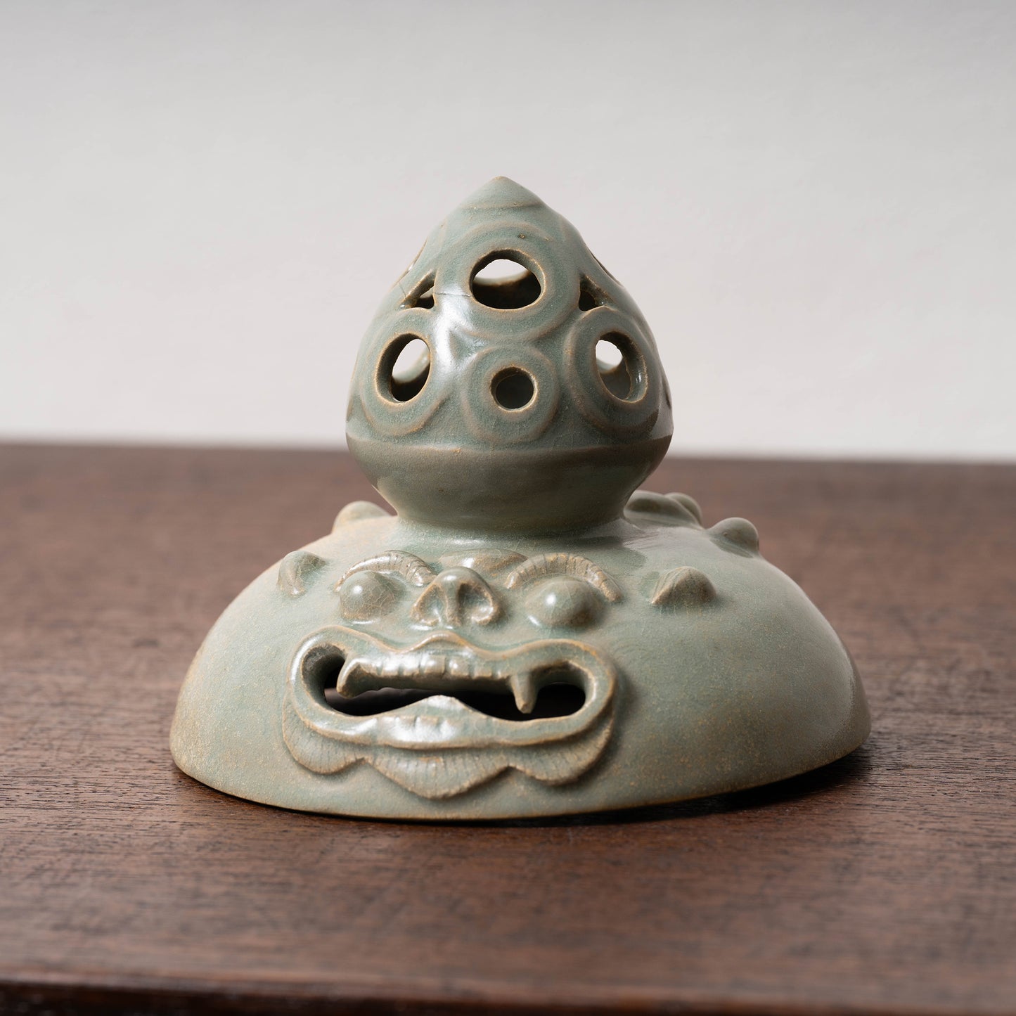 Goryeo Celadon Censer with Animal Face Lid and Openworked Dragon Design