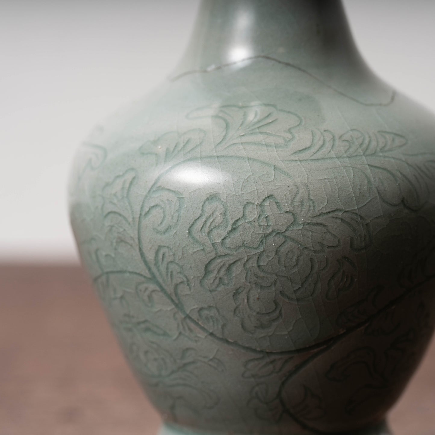 Goryeo Celadon Bottle with Incised Flower Design