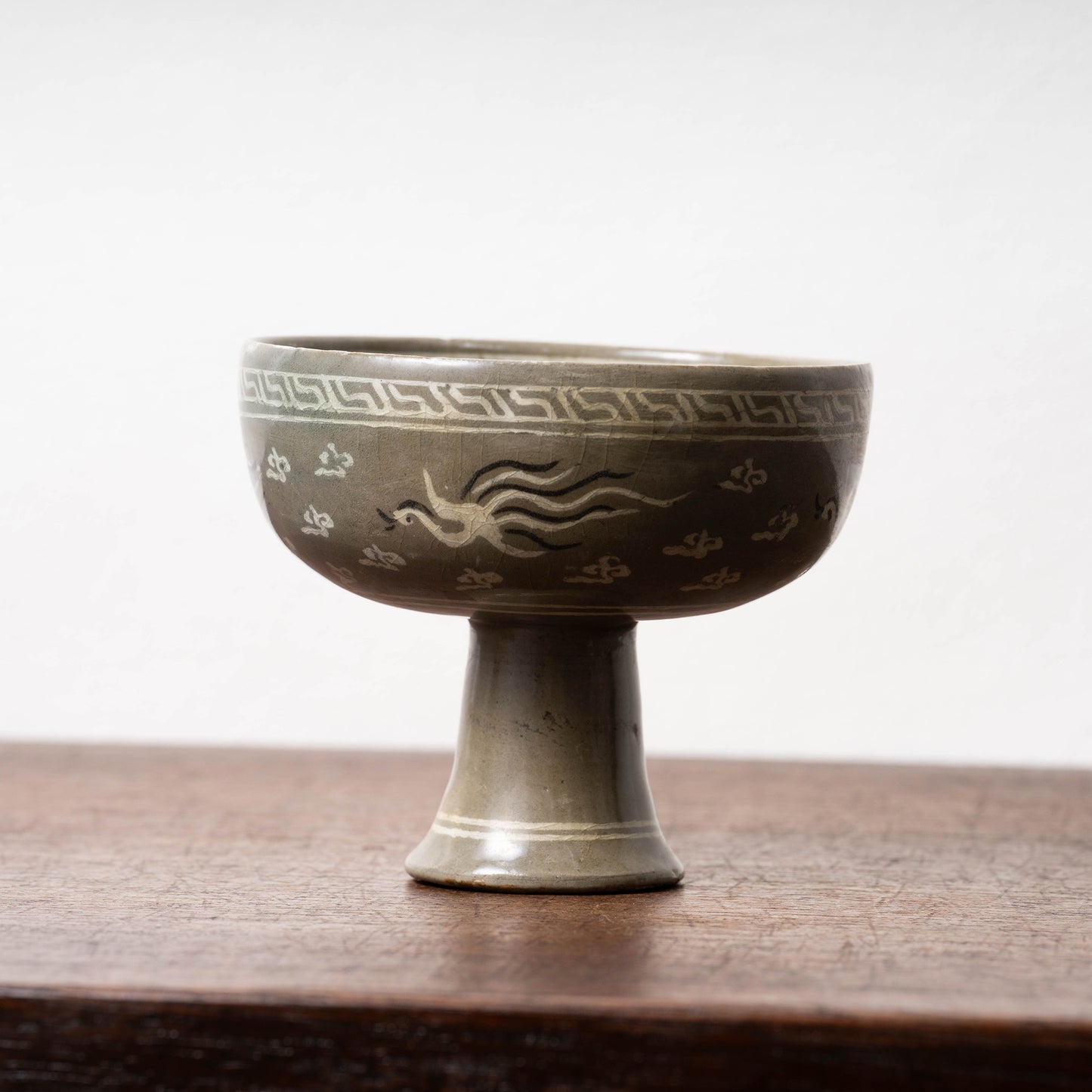 Goryeo Celadon Stem Cup with Inlaid Cloud Dragon Phoenix Design