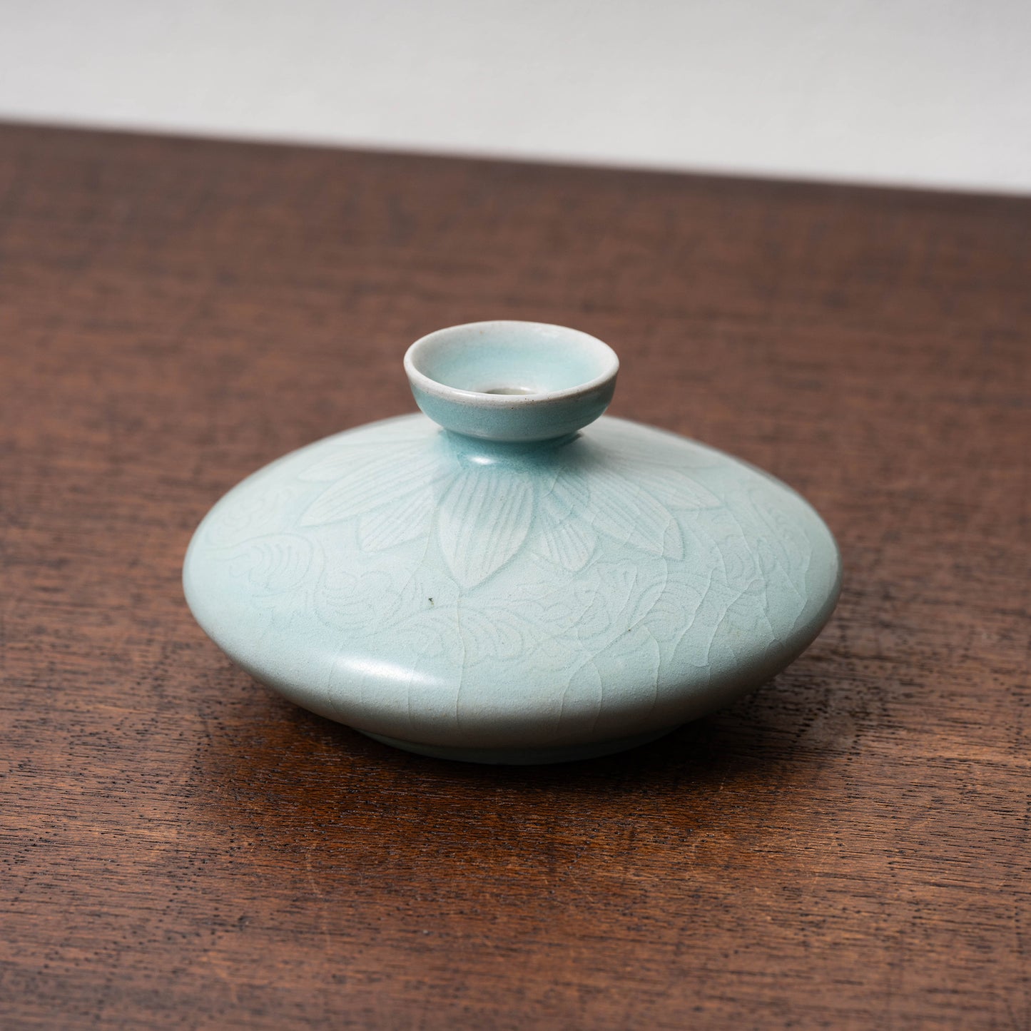 Goryeo Celadon Oil Pot with Carved Lotus Design