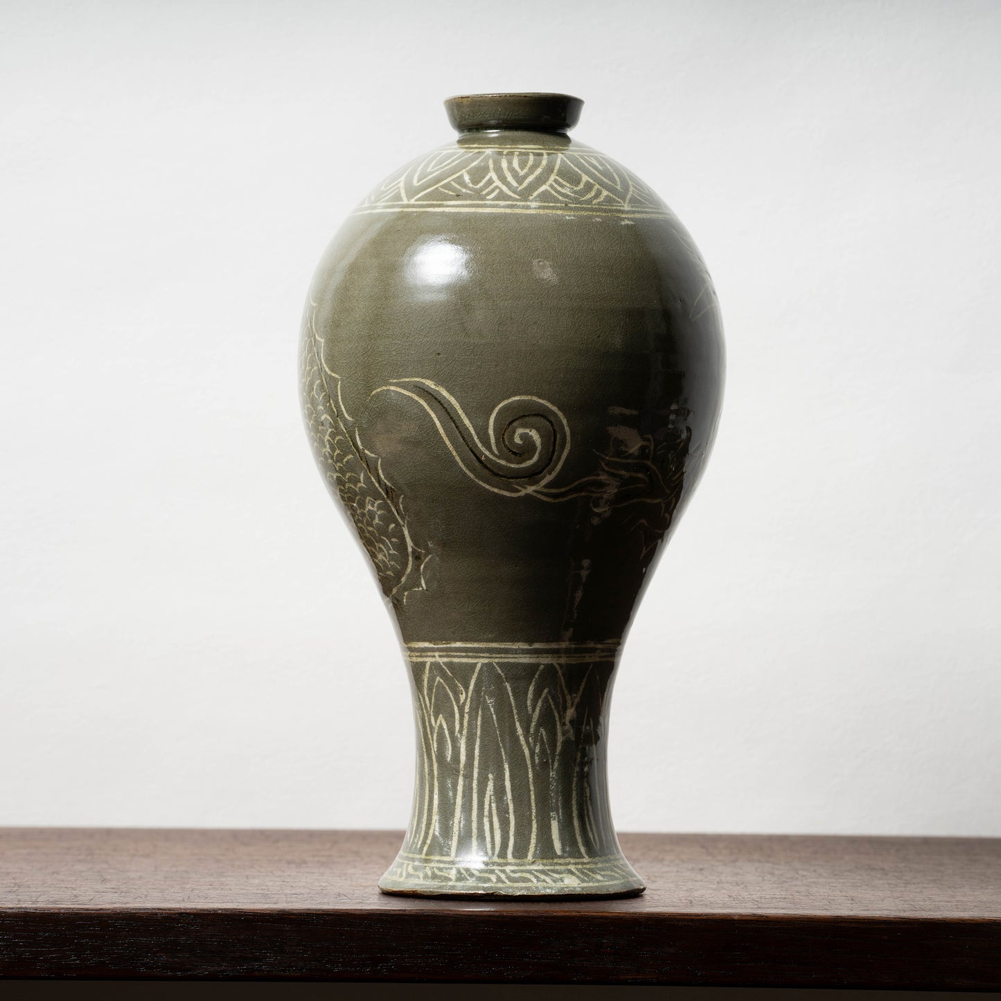 Goryeo Dynasty Celadon Mei-ping Vase with Inlaid Fish-Dragon Design