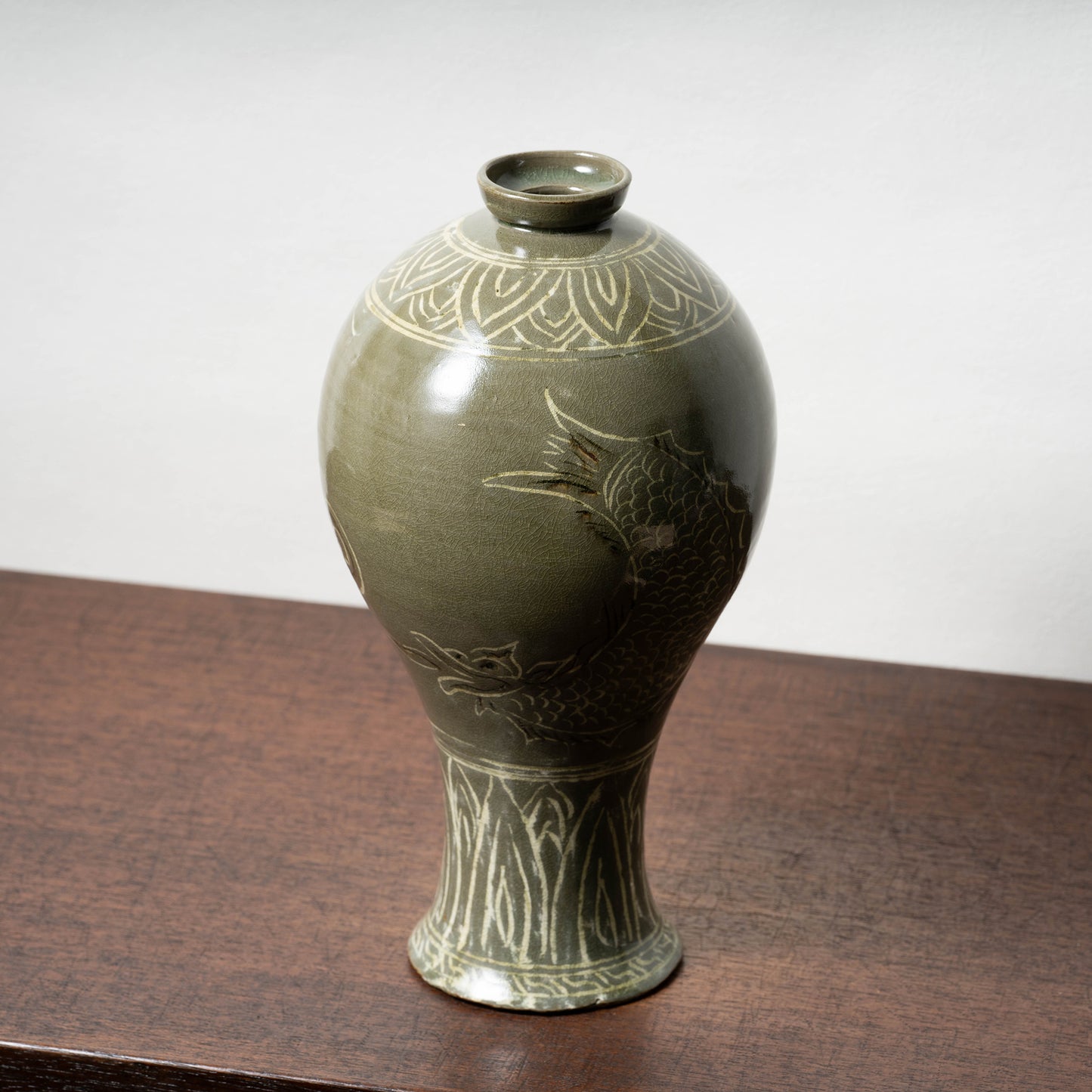 Goryeo Dynasty Celadon Mei-ping Vase with Inlaid Fish-Dragon Design