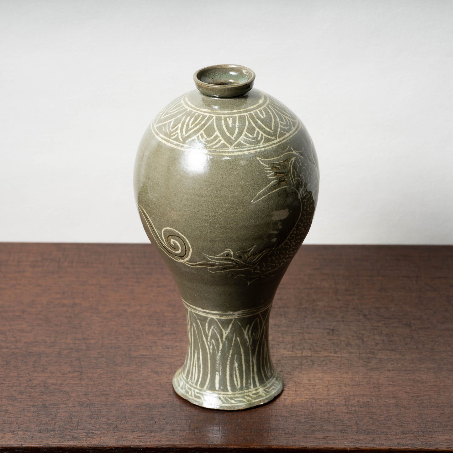 Goryeo Dynasty Celadon Mei-ping Vase with Inlaid Fish-Dragon Design