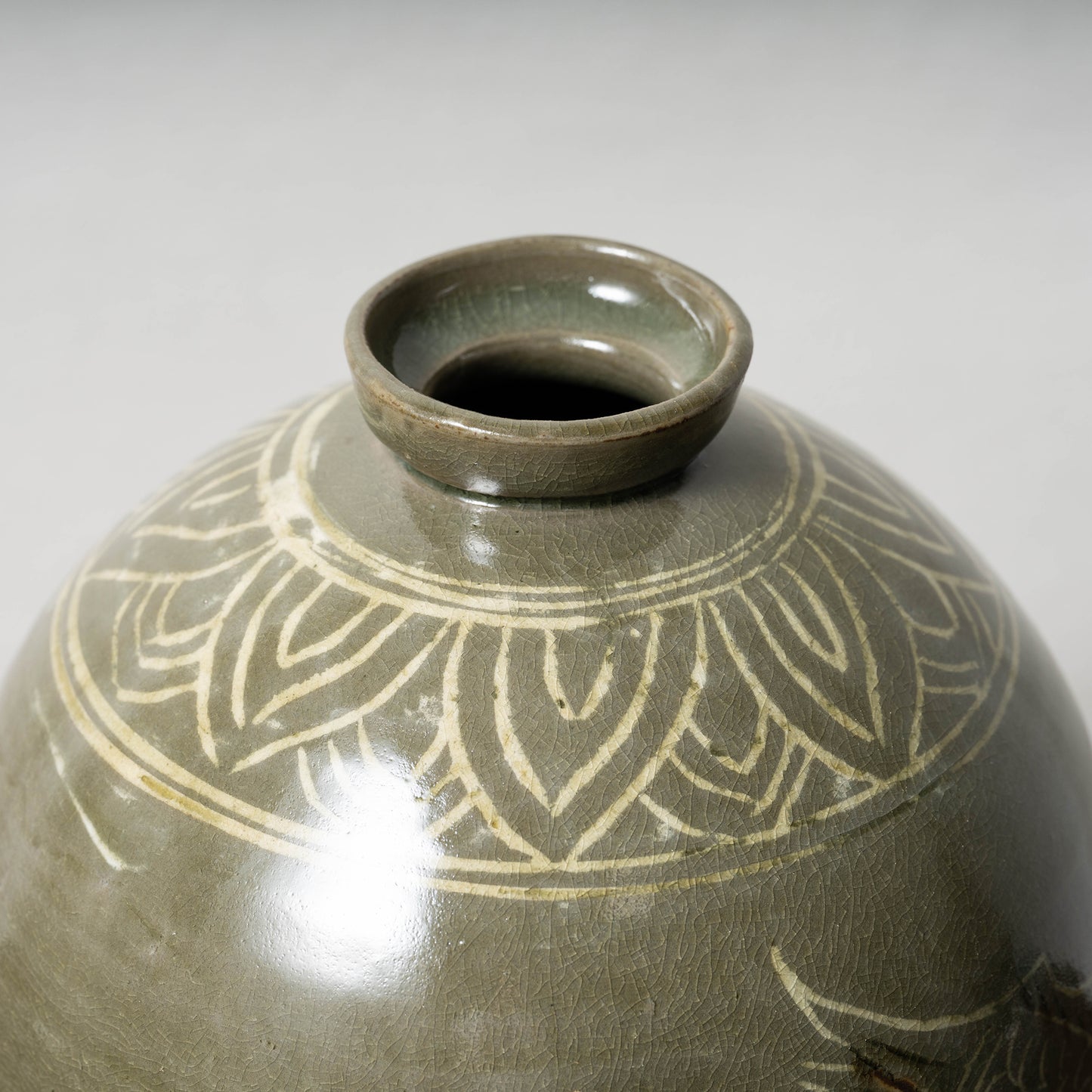Goryeo Dynasty Celadon Mei-ping Vase with Inlaid Fish-Dragon Design