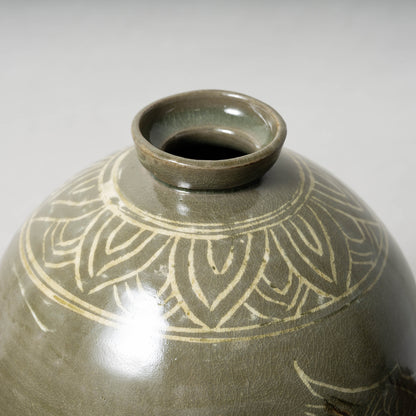 Goryeo Dynasty Celadon Mei-ping Vase with Inlaid Fish-Dragon Design
