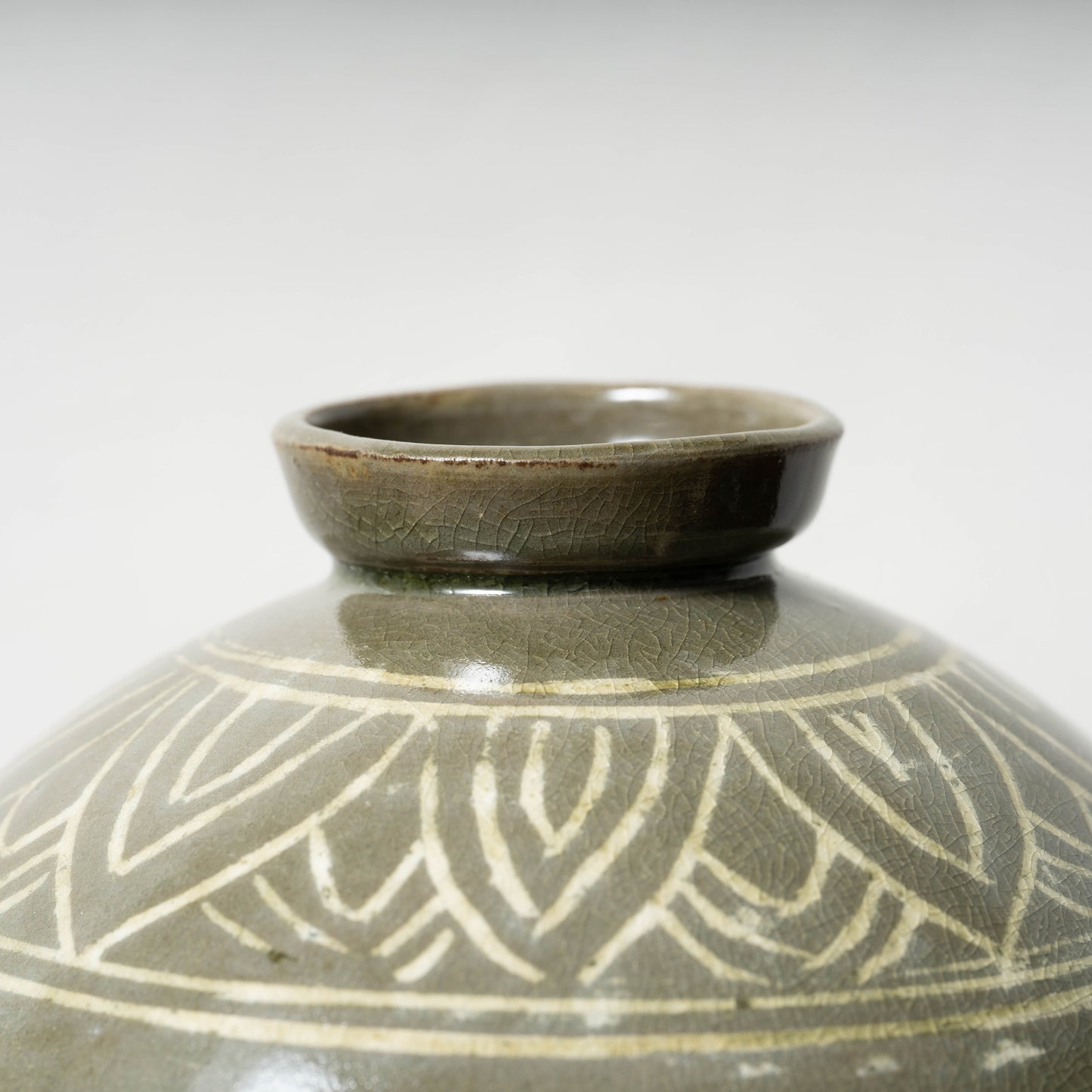 Goryeo Dynasty Celadon Mei-ping Vase with Inlaid Fish-Dragon Design