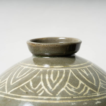 Goryeo Dynasty Celadon Mei-ping Vase with Inlaid Fish-Dragon Design