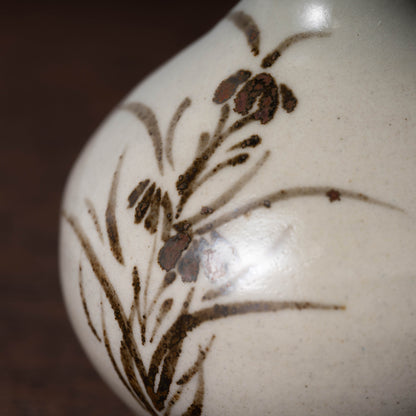 Joseon Dynasty White Porcelain Bottle with Flower Design