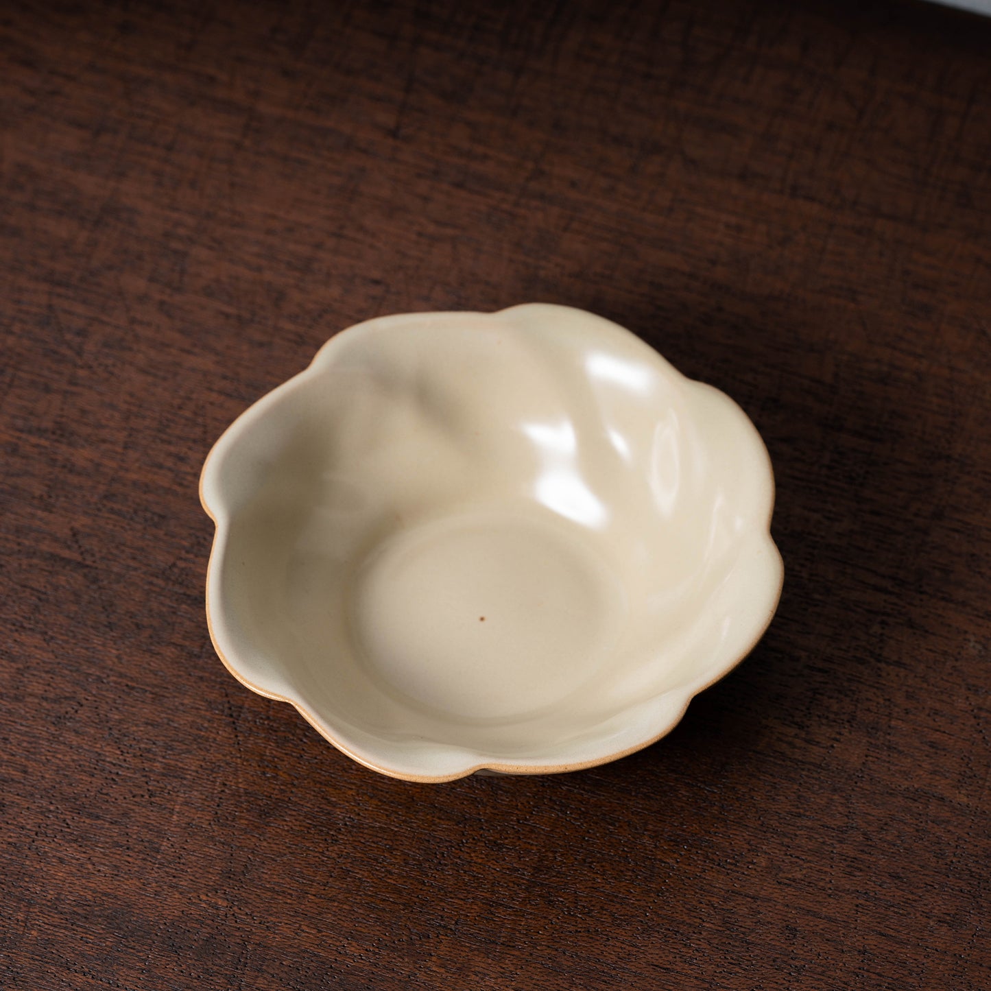Qing Dynasty Rice-colored celadon Tea Bowl with Ru ware-like and Flower Design