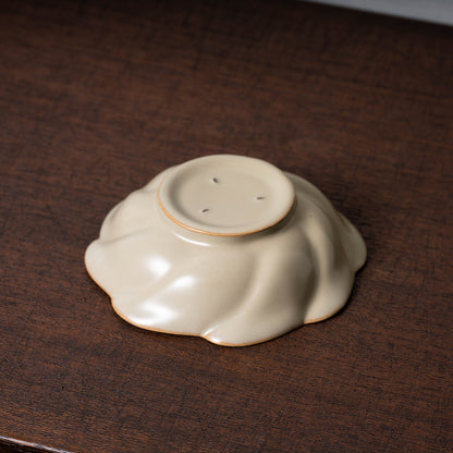Qing Dynasty Rice-colored celadon Tea Bowl with Ru ware-like and Flower Design