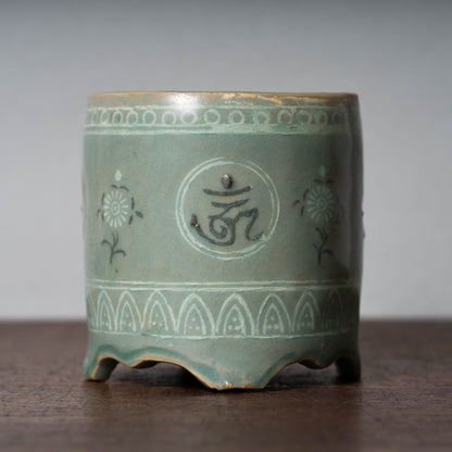 Goryeo Dynasty Celadon Jar and cover with Inlaid Sanskrit Characters