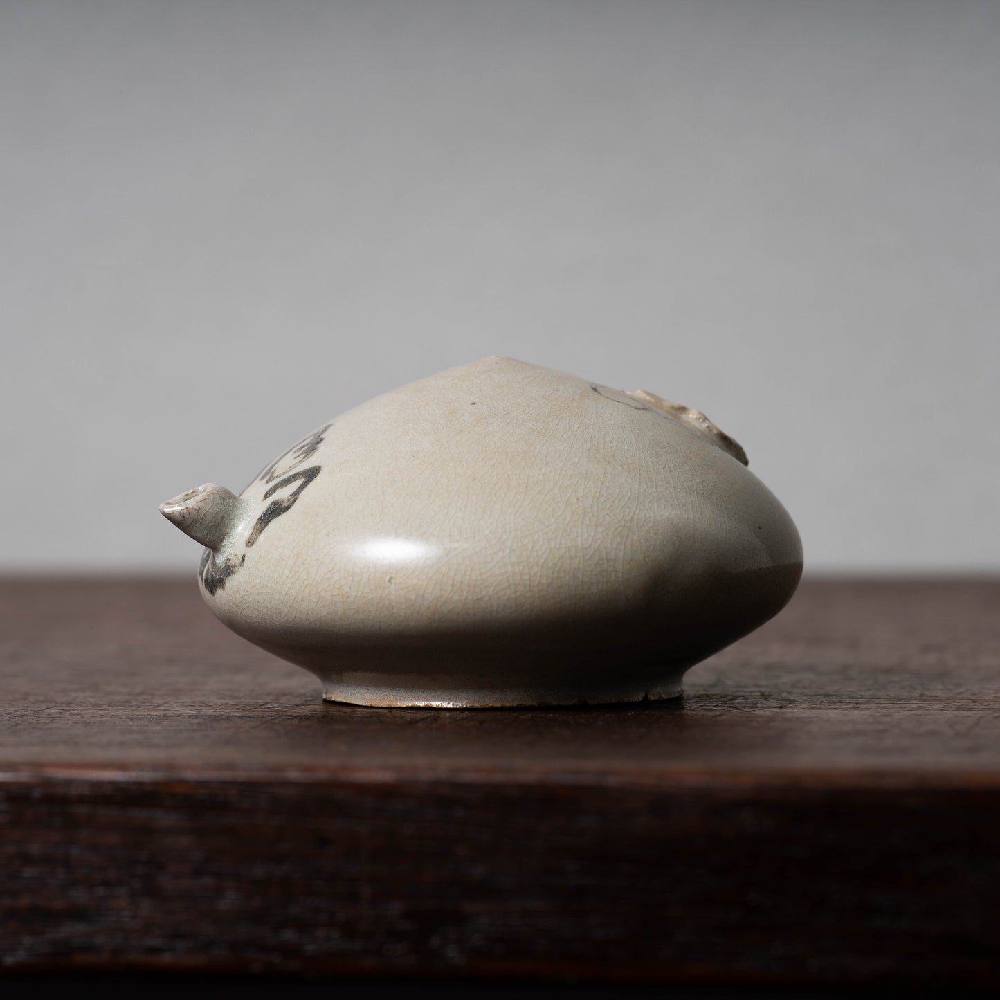 Joseon Dynasty White Porcelain Water Dropper with Flower Design in Underglaze Iron